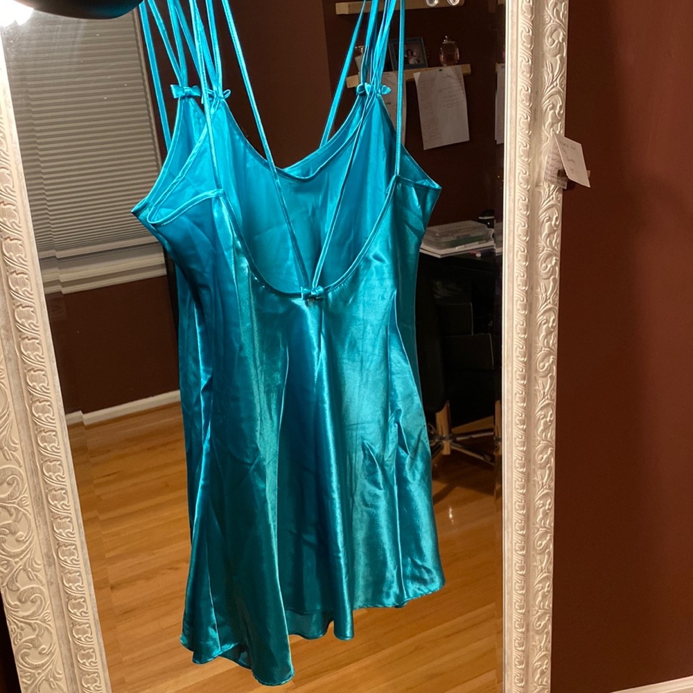 Turquoise silk mini slip.